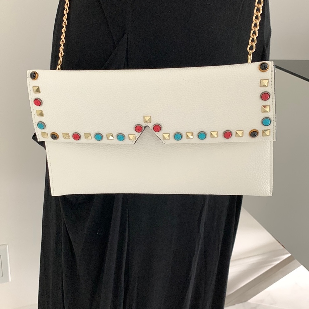 White clutch, crossbody, wristlet bag